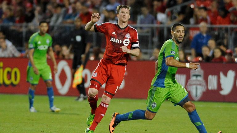 Steven Caldwell in action for Toronto FC against Clint Dempsey and the Seattle Sounders.