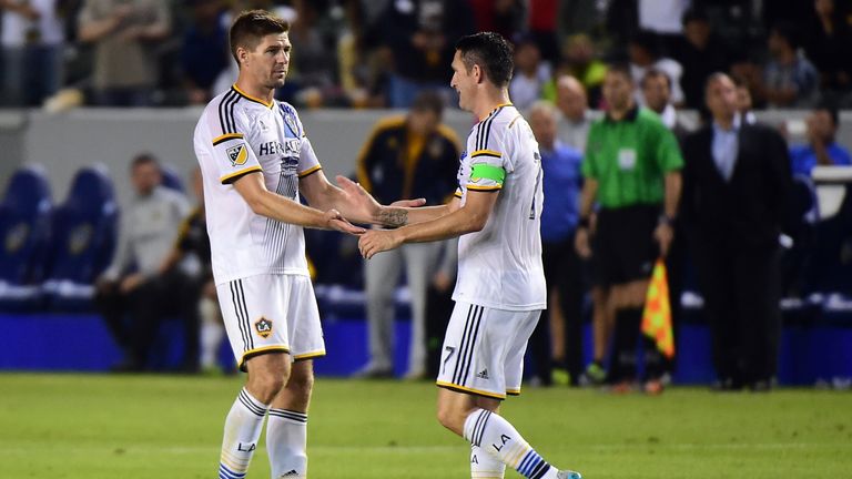 Robbie Keane of LA Galaxy (right) celebrates with Steven Gerrard (left).