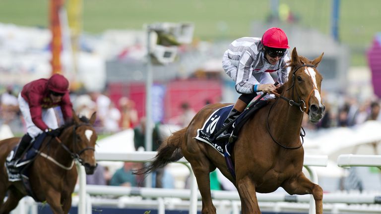 Richard Hughes rides Talent to victory in The Oaks in 2013, the second classic in his career just one month after his first on Sky Lantern