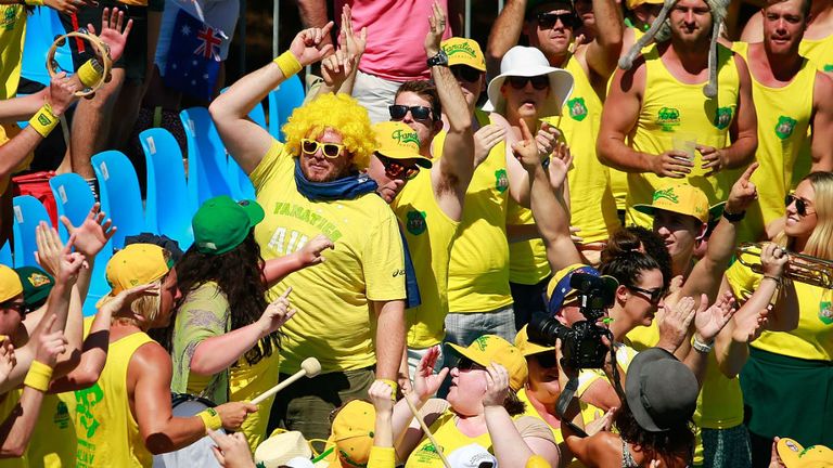 Australia fans in the crowd show their support as Sam Groth and Lleyton Hewitt of Australia in the Davis Cup