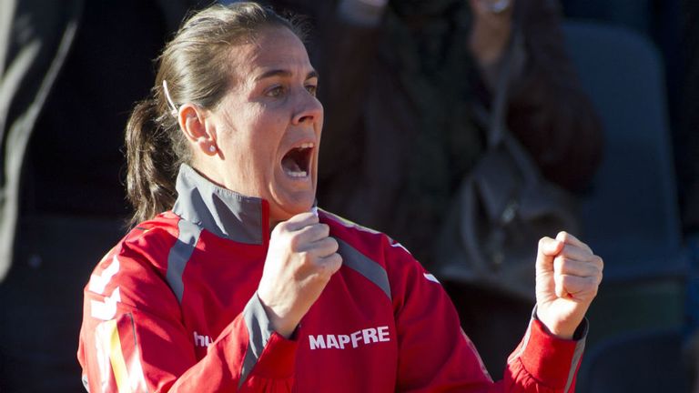 Spain's captain Conchita Martinez celebrates Spain's Silvia Soler's victory at the end of the International Tennis Federation Fed Cup