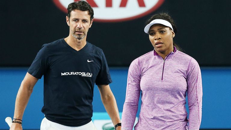 Serena Williams listens to coach Patrick Mouratoglou during a practice session ahead of the 2015 Australian Open