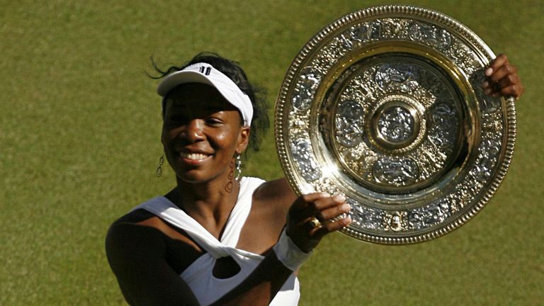 Venus Williams celebrates after beating her sister Serena in the 2008 Wimbledon final