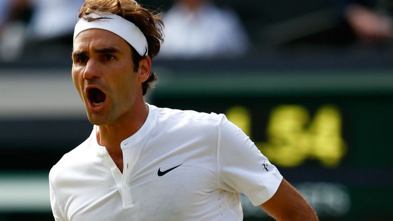 Roger Federer celebrates beating Andy Murray during their men's semi-final at Wimbledon