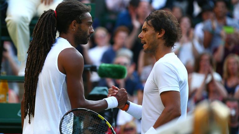 Germany's Dustin Brown celebrates beating Spain's Rafael Nadal at Wimbledon