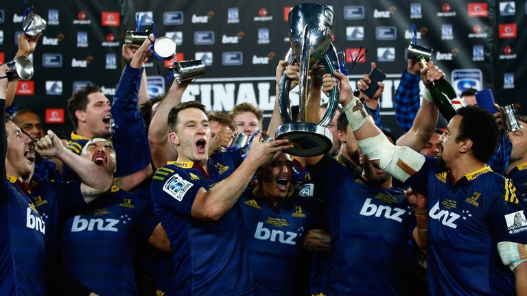  Ben Smith and Nasi Manu of the Highlanders hold up the trophy following the Super Rugby Final