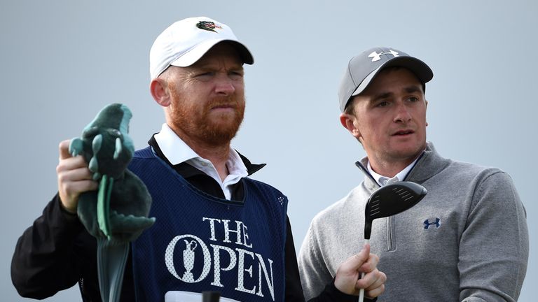 Amateur Paul Dunne of Ireland and caddie Alan Murrey look on from the 6th tee during the first round of the 144th Open Championship