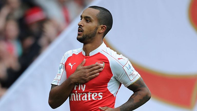 Theo Walcott celebrate scoring for Arsenal during the match between Arsenal and VfL Wolfsburg