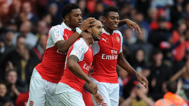 Theo Walcott celebrates scoring the Arsenal goal with (L) Chuba Akpom and (R) Jeff Reine-Adelaide 