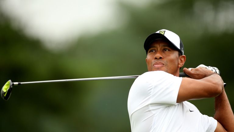 Tiger Woods tees off on the 11th hole during the second round of the Greenbrier Classic at the Old White TPC
