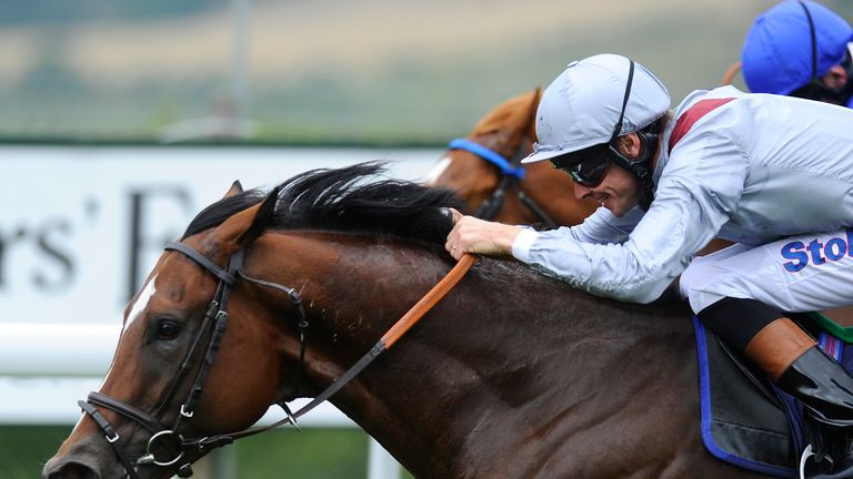 Richard Hughes gets Toronado up to win the Sussex Stakes a shade cosily at Goodwood