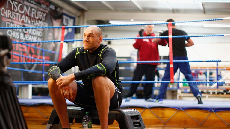 LONDON, ENGLAND - FEBRUARY 25:  Tyson Fury is interviewed after a media workout at the Peacock Gym on February 25, 2015 in London, England.  (Photo by Juli