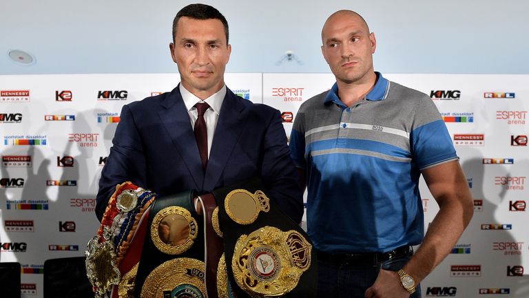 DUESSELDORF, GERMANY - JULY 21:  Wladimir Klitschko and Tyson Fury pose during a press conference