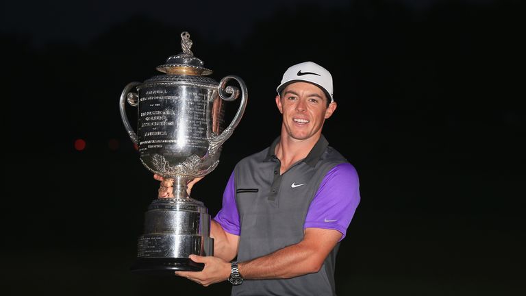 Rory McIlroy of Northern Ireland poses with the Wanamaker Trophy after his one-stroke victory on August 10, 2014