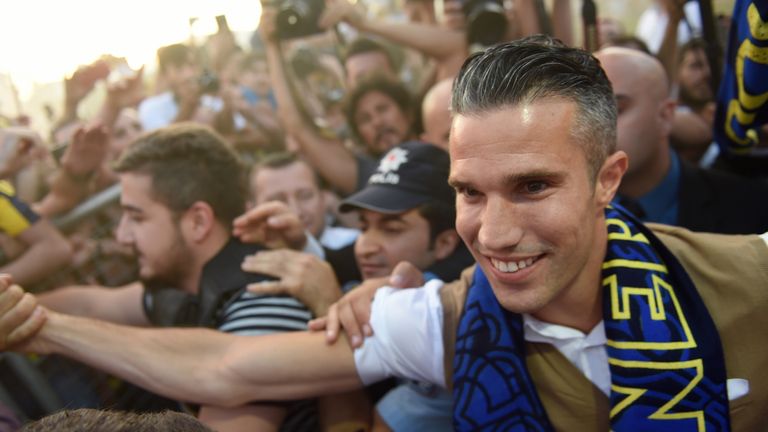 Robin Van Persie arrives at the airport in Istanbul on Sunday afternoon