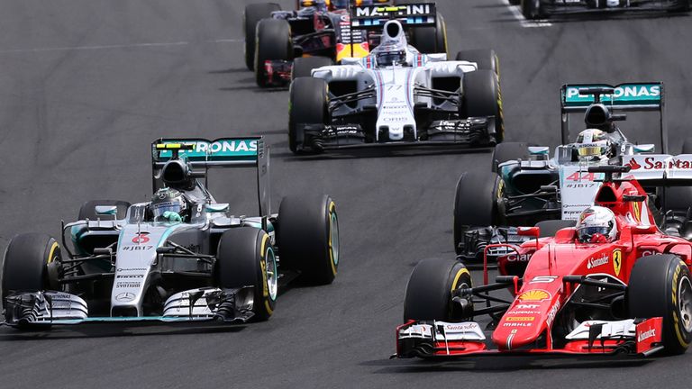 Sebastian Vettel leads into the first corner