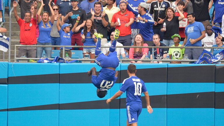 Victor Moses #20 of Chelsea does a flip after scoring a goal