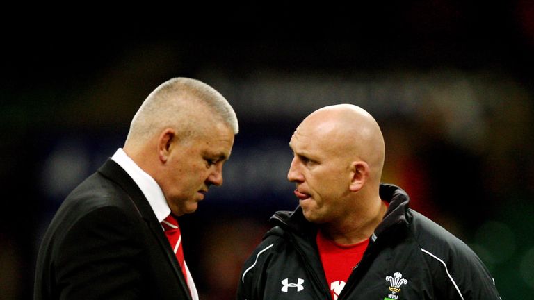 Wales head coach Warren Gatland and assistant Shaun Edwards look on as the players warm up during the Autumn Internationals