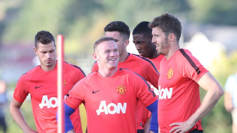 Wayne Rooney and  Michael Carrick of Manchester United in action 