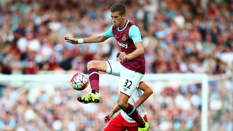 Reece Burke controls the ball
