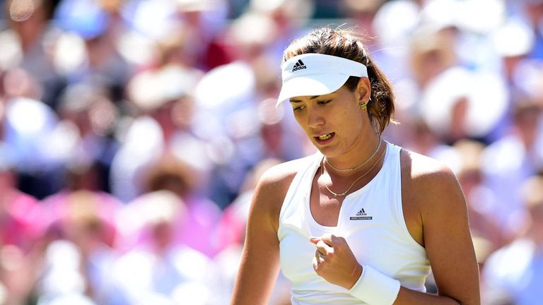 Garbine Muguruza celebrates against Agnieszka Radwanska during day 10 of Wimbledon