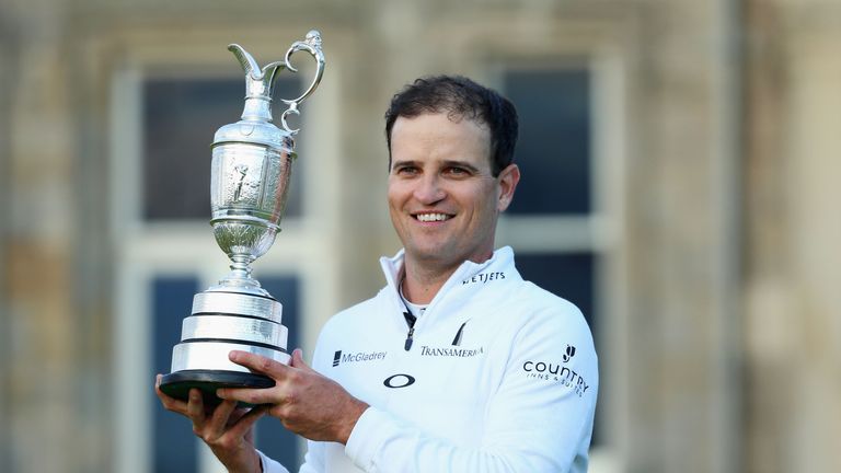 Zach Johnson holds the Claret Jug after winning the 144th Open