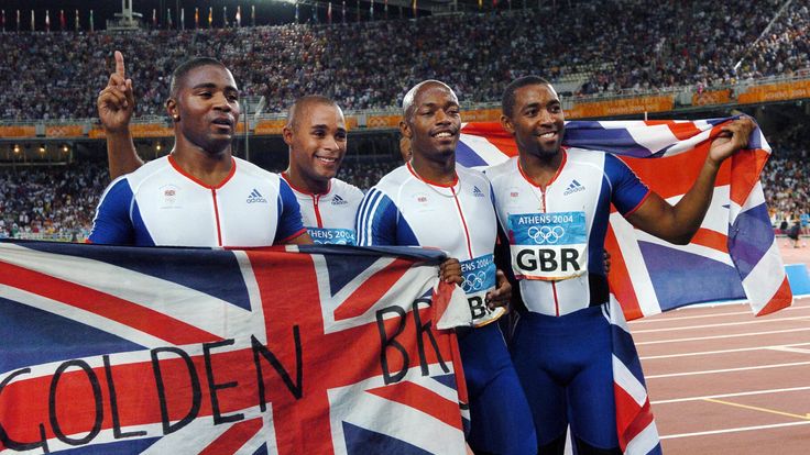Campbell (far right) celebrates relay gold with Mark Lewis-Francis, Jason Gardener, and Marlon Devonish in 2004