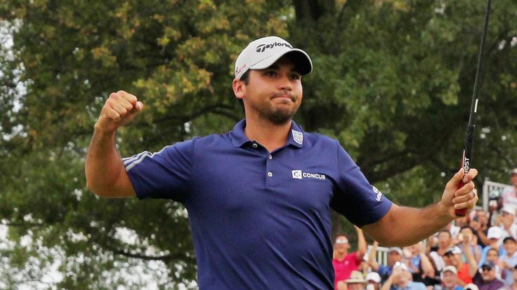 Jason Day celebrates on the 18th green after his six-stroke victory at The Barclays