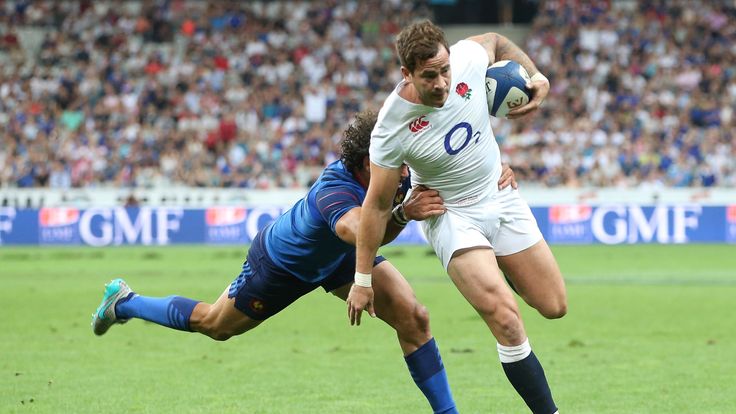 Danny Cipriani of England breaks clear of Yoann Huget to score a try