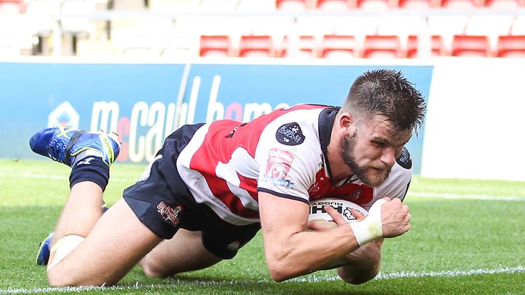 Leigh's Liam Kay scores a try against Wakefield