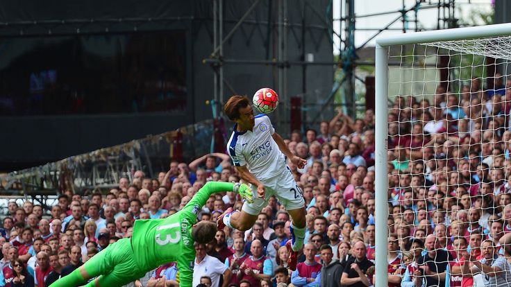 Shinji Okazaki of Leicester City scores his team's first goal during the Barclays Premier League match with West Ham United