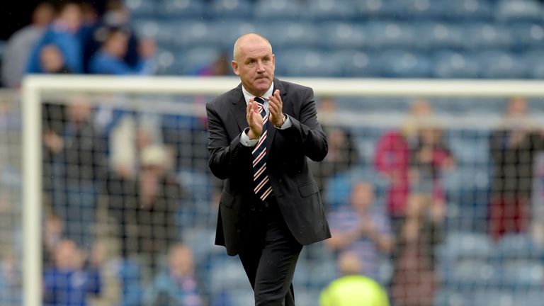 02/08/15 SCOTTISH LEAGUE CUP FIRST ROUND.RANGERS V PETERHEAD.IBROX - GLASGOW.Rangers manager Mark Warburton applauds the home fans after the final whistle.
