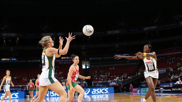 Maryka Holtzhausen (L) and Bongiwe Msomi of South Africa in action during the match between South Africa and Wales on day 5 