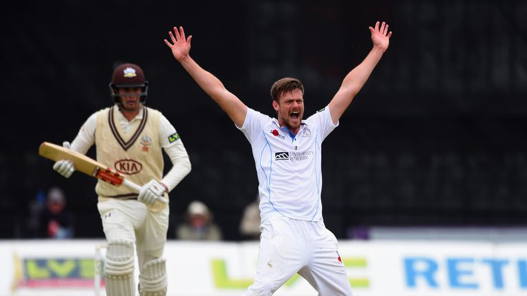 Wayne White celebrates the wicket of Surrey s Dominic Sibley during Derbyshires LV County Championship match on June 23, 2015, in Derby. Photo: Laurence Griffiths/Getty Images