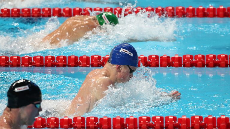Adam Peaty (C) on his way to 50m breaststroke gold at the World Championships