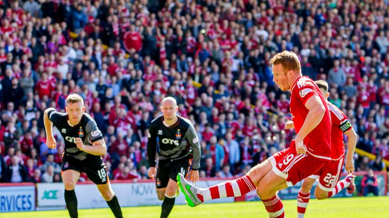 Adam Rooney scores a penalty for Aberdeen against Kilmarnock. 