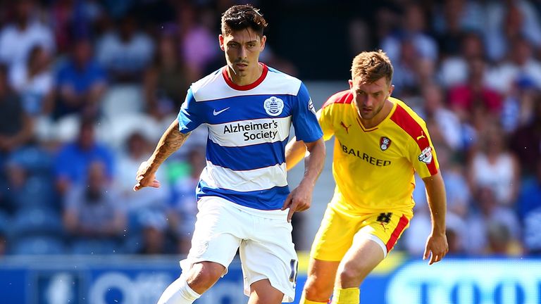 Alejandro Faurlin of QPR takes the ball past Lee Frecklington of Rotherham 
