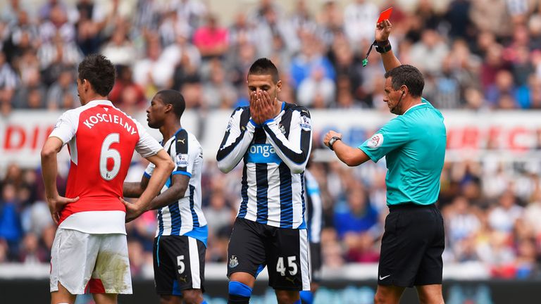 Aleksandar Mitrovic of Newcastle United is shown a red card 