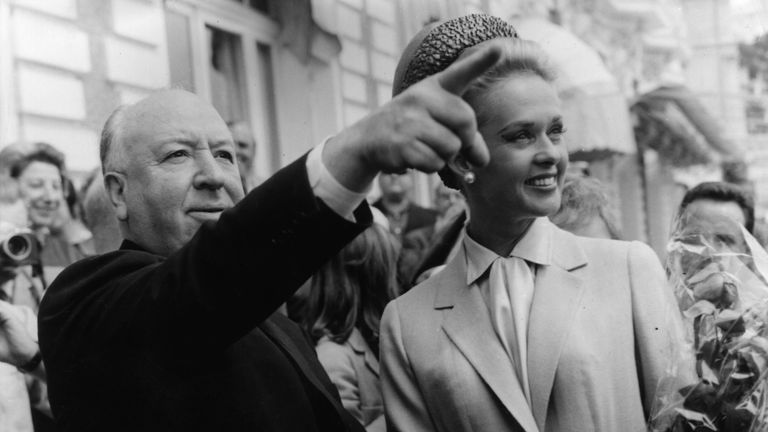 9th May 1963:  Alfred Hitchcock and American actress Tippi Hedren explore Cannes together after the premiere of his latest thriller 'The Birds' in which sh
