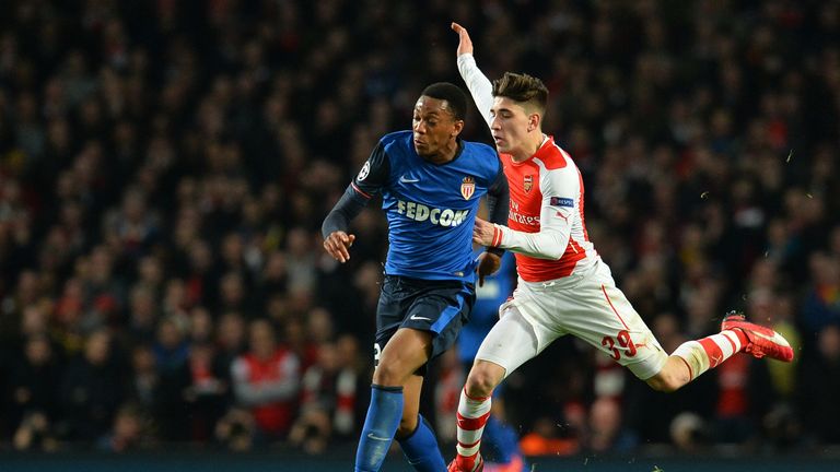 Monaco's Anthony Martial (L) tussles with Arsenal's Hector Bellerin during last season's Champions League round of 16 first leg match at the Emirates
