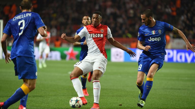 Monaco's French forward Anthony Martial (C) controls the ball during the UEFA Champions League quarter final second leg match AS Monaco vs Juventus