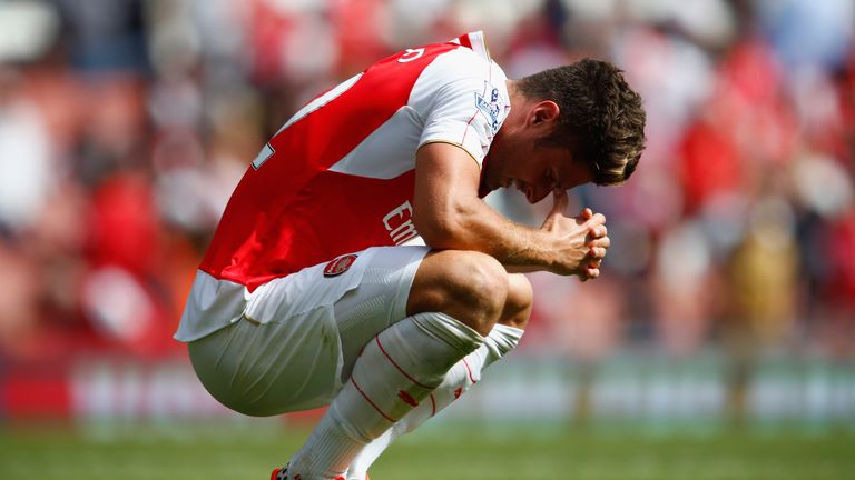 Olivier Giroud of Arsenal looks dejected after defeat to West Ham