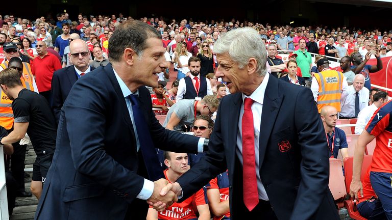 Arsenal manager Arsene Wenger shakes hands with West Ham boss Slaven Bilic