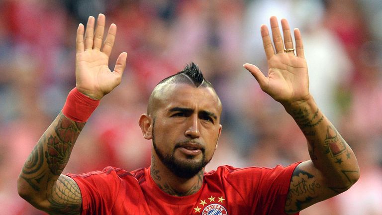 Arturo Vidal waves to the Bayern Munich fans