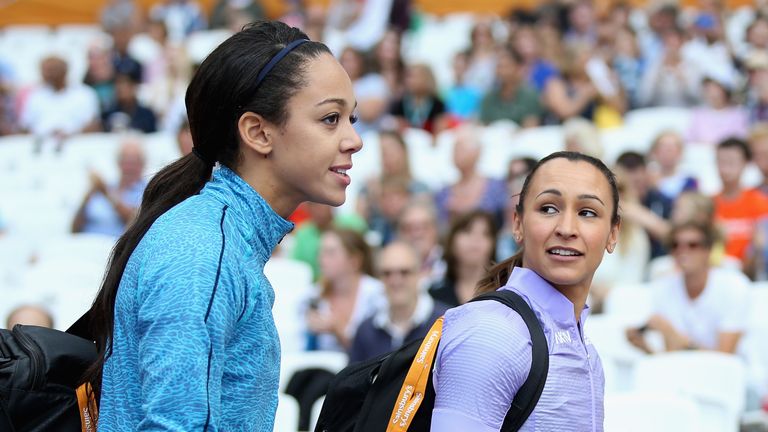 Katarina Johnson-Thompson (L) and Jessica Ennis-Hill of Great Britain walk out into the stadium