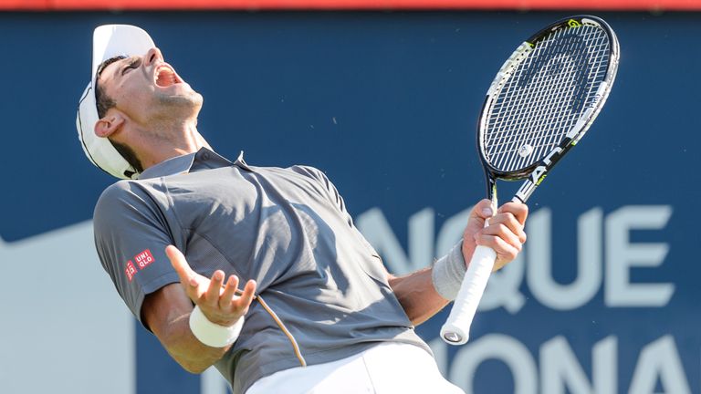 Novak Djokovic reacts after losing a point against Andy Murray during the Rogers Cup final