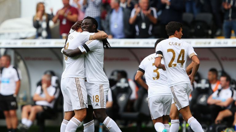 Bafetimbi Gomis of Swansea City celebrates scoring his team's first goal against Newcastle United