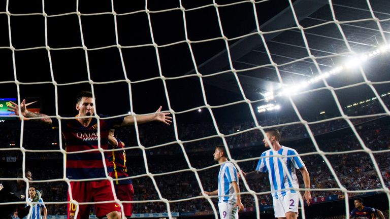 Lionel Messi celebrates Thomas Vermaelen's winning goal