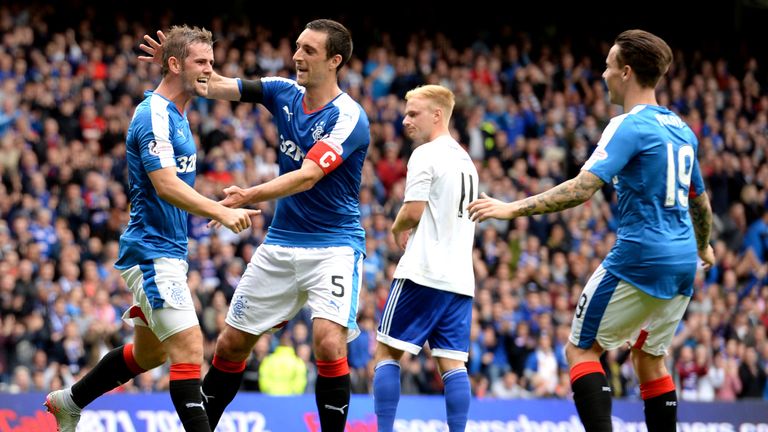 02/08/15 SCOTTISH LEAGUE CUP FIRST ROUND.RANGERS V PETERHEAD.IBROX - GLASGOW.David Templeton (left) celebrates his strike with Rangers team-mates.