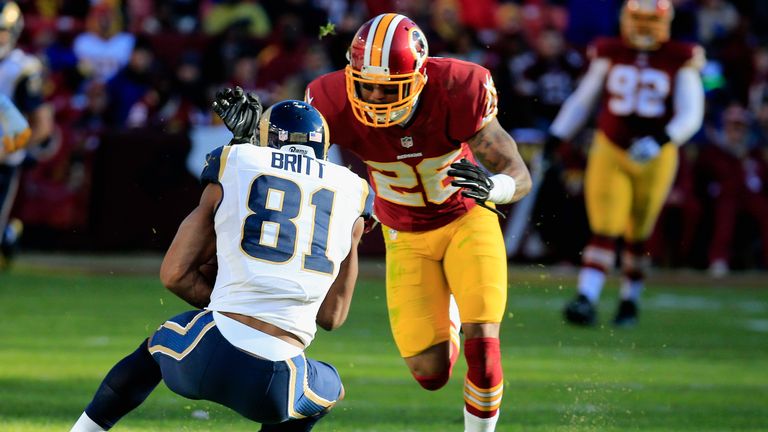 St Louis Rams receiver Kenny Britt is tackled by Bashaud Breeland of the Washington Redskins.
